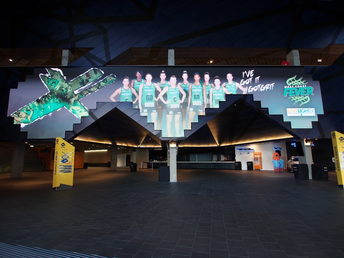 Image of a large LED Screen advertising the West Coast Fever netball team